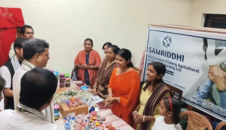 Chief Minister Manik Saha visits the Samriddhi MPACS stall at the Cooperative Fair, where members showcased locally made spices, pickles, candles and other products.